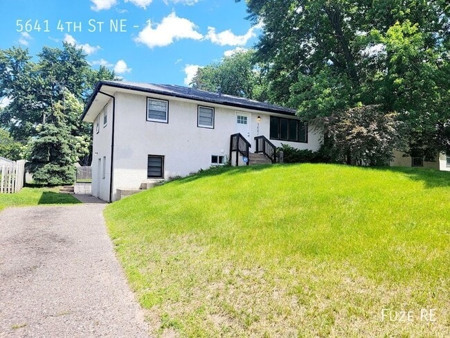 Building Photo - 5641 4th St NE Unit 1