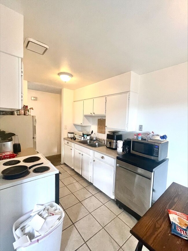 Photo - Spacious Upper Level 2 Bdrm 1 Bath (Family... Apartment Unit 4