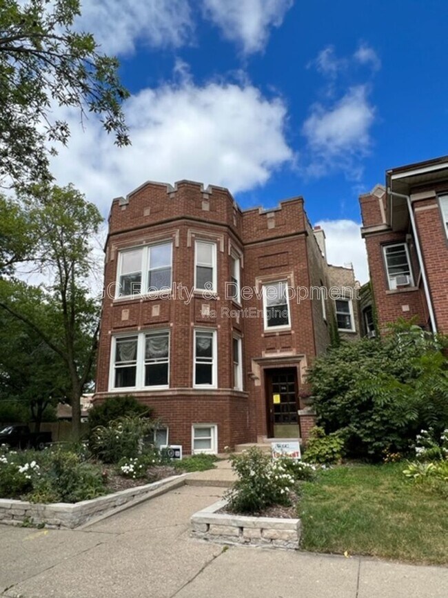 Building Photo - 2144 W Estes Ave Unit 2