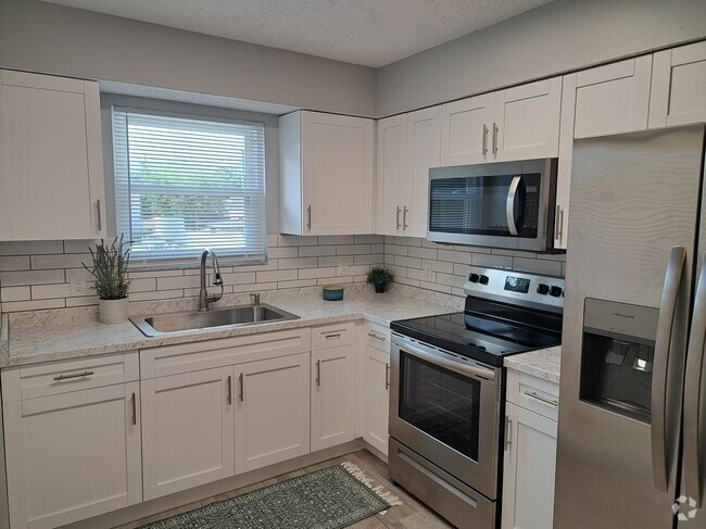 Building Photo - 6405 Cooper Ln Unit 4 Rental
