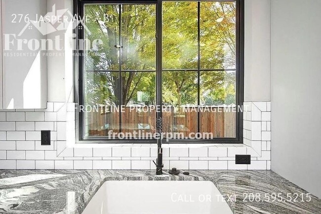 Photo - 276 Jasper Ave