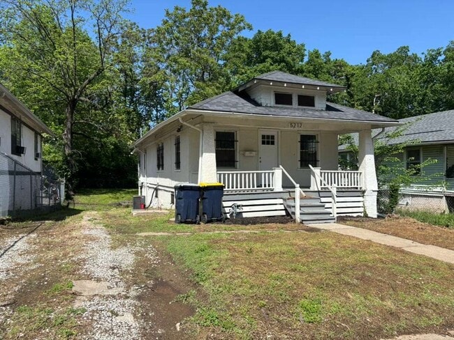 Building Photo - Midtown KC Charm with Sunroom, Private Drive & Updated Finishes
