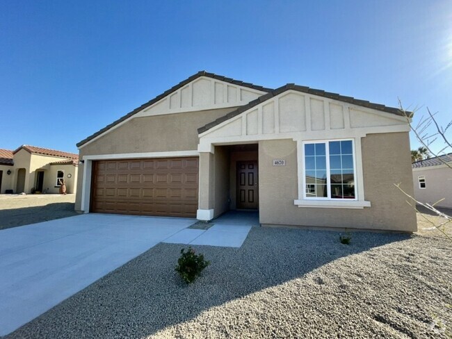 Building Photo - 4 bed 2 bath 2 car garage in gated Community Rental