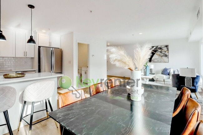 Building Photo - Brand New End-Unit 3-Bedroom Townhome with Garage, Driveway & EV Charger – First Occupancy!