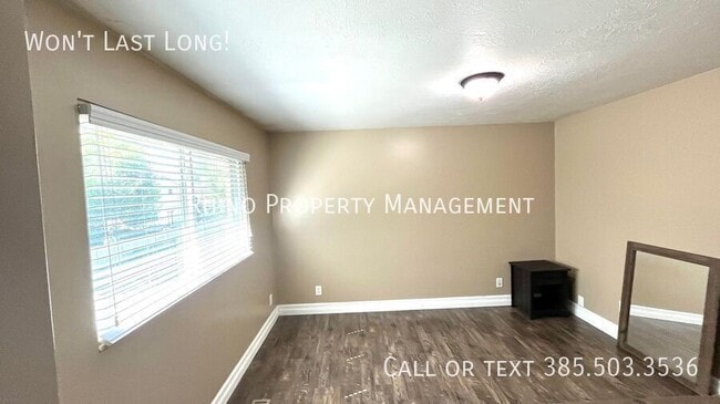 Photo - 5658 S Vlg Cir Apartment Unit Bedroom 1