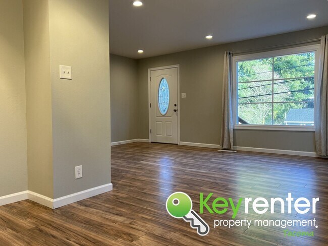 Photo - Modern Fircrest Gem: Sleek Design, Quartz Counters & Natural Oasis!