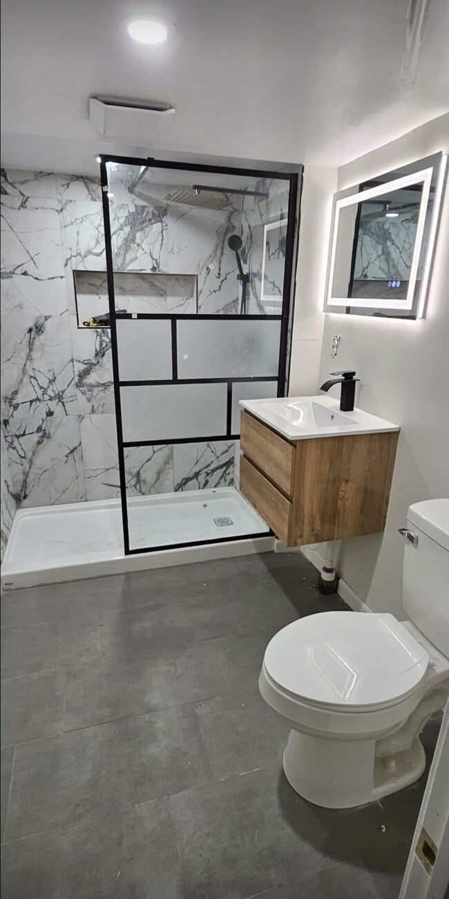 Photo - 2437 S Milan St Unidad Charnat Homes