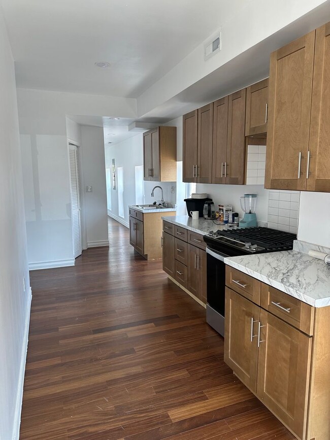 Building Photo - Newly Renovated, Spacious Home! W/D Hook-Up, Close to JHU, KKI and Public Transportation! Availab...