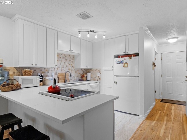 Photo - Bright & Inviting 2-Bed, 1.5-Bath with Modern Touches and Private Upstairs Retreat