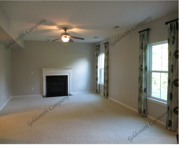 "4-Bed in Greenville - Spacious 2,389 Sq Ft with Fireplace & Hardwood Floors!"