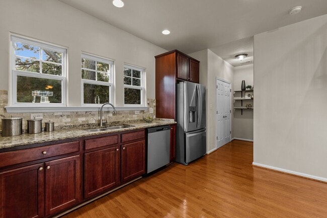 Photo - Welcome to this stunning 3-bedroom, 3.5-bath tri-level condo!