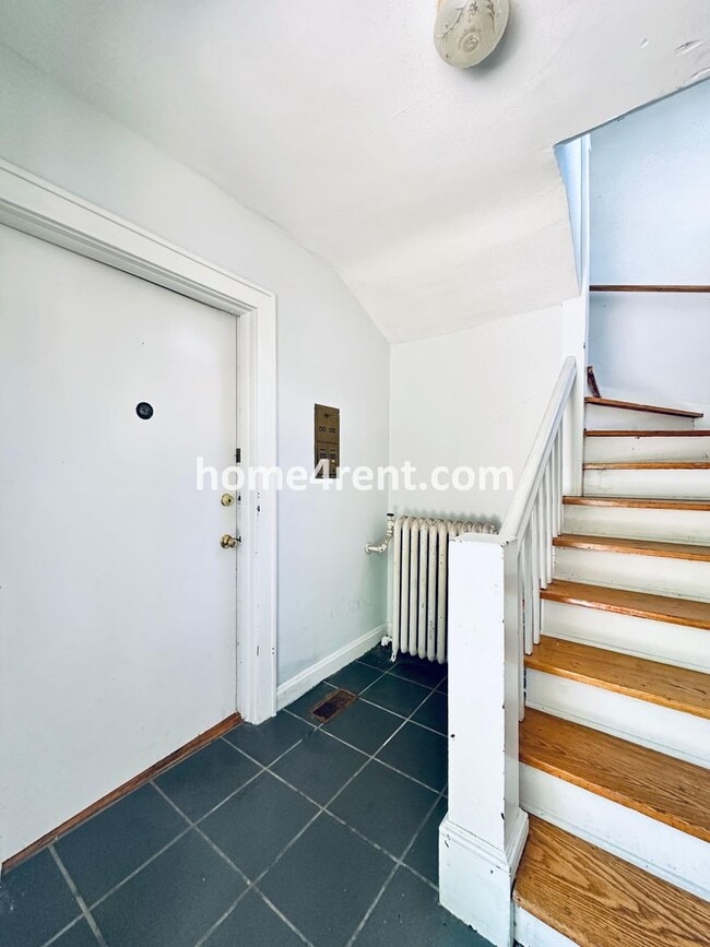 Photo - First Level Condo, Just Off the Plaza with Hardwood Floors and Lawn Care Provided!