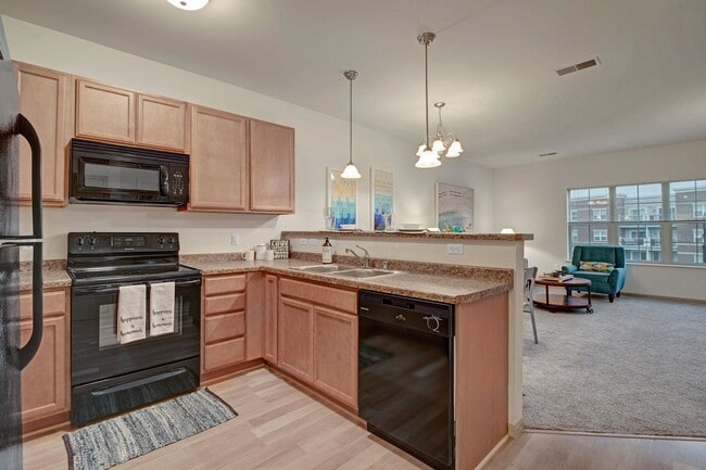 Beautiful Kitchen with Hard Surface Flooring - Swan Creek Apartments