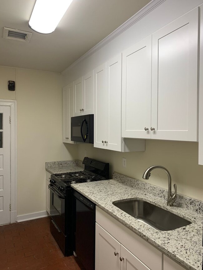 Photo - Renovated 3 Bedroom Townhouse! Off Street parking and Washer/Dryer!!