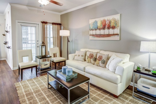 Living room with access to outdoor patio