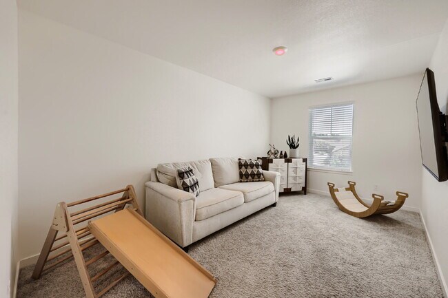 Photo - "Spacious 5-Bed Oasis with 3 Full Baths in Scenic Castle Rock – Your Dream Home Awaits!"