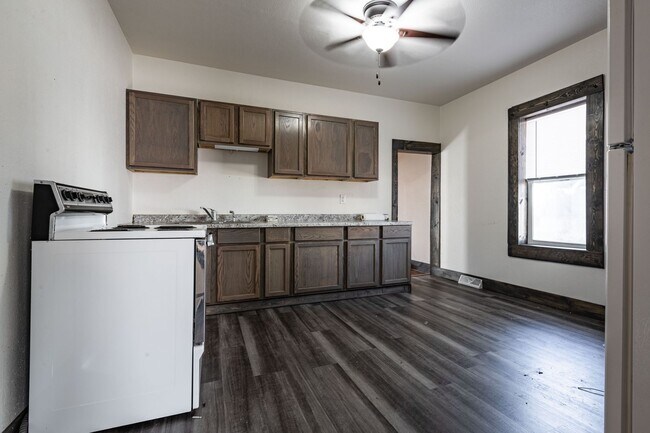 Photo - House w/ Yard and Garage