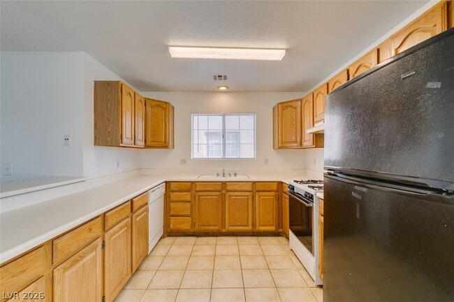 Building Photo - 1375 E Hacienda Ave Unit 211