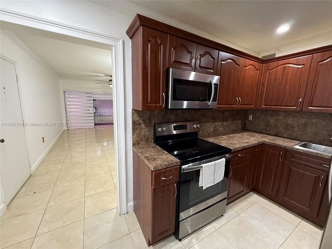 Photo - 1560 W 46th St Unit 115