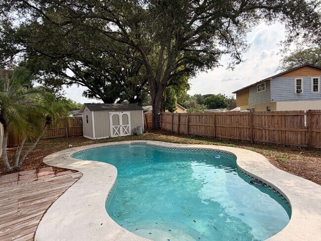 "Discover Your Oasis: Stylish 3-Bed, 2-Bath Home with Granite Touches & Private Pool in Tampa!"