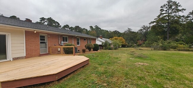 Photo - Walk to the river from this convenient rancher near Willow Oaks