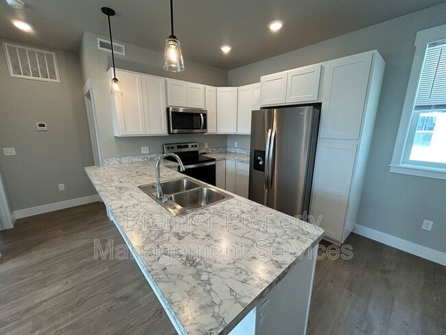 Building Photo - 6086 Northstead Ave Unit 202