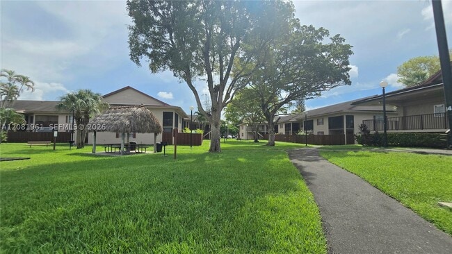 Building Photo - 11259 SW 88th St Unit 104H