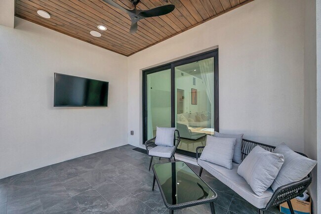 Photo - Luxury Living in Grand Central District: Exquisite Furnished Home with Pool