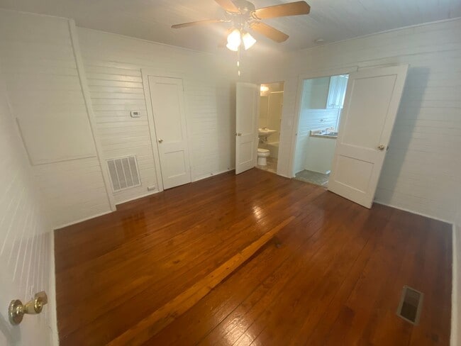 Photo - Walltown duplex with gleaming floors, a front porch, and a large pantry — all under $1,300. Unit B