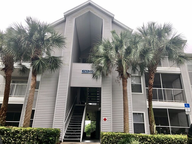 Building Photo - WATER VIEW! 2X2- Spacious 3rd floor condo with tranquil water views from balcony!! Gated Regency ...