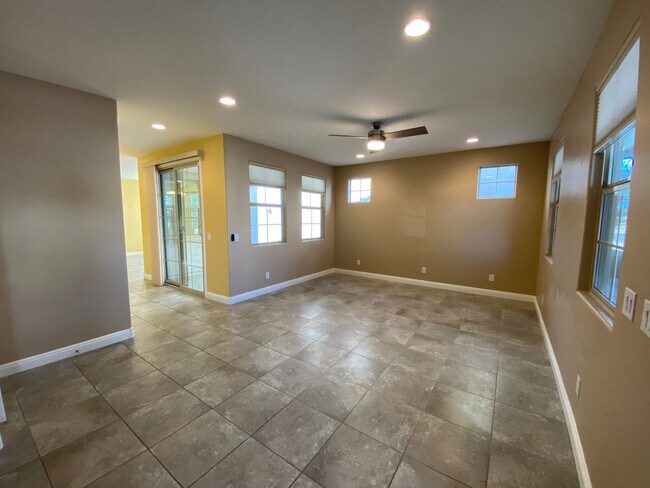 Photo - 3-Bed Home with Community Pool Access, Low-Maintenance Yard, and Upgraded Kitchen, Featuring Gran...