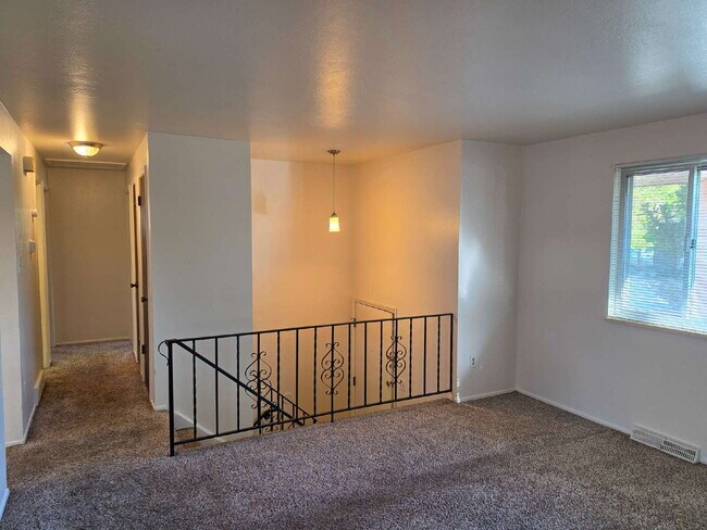 Photo - "Charming 3-Bed Retreat with Finished Basement & Cozy Fireplace in Aurora!"