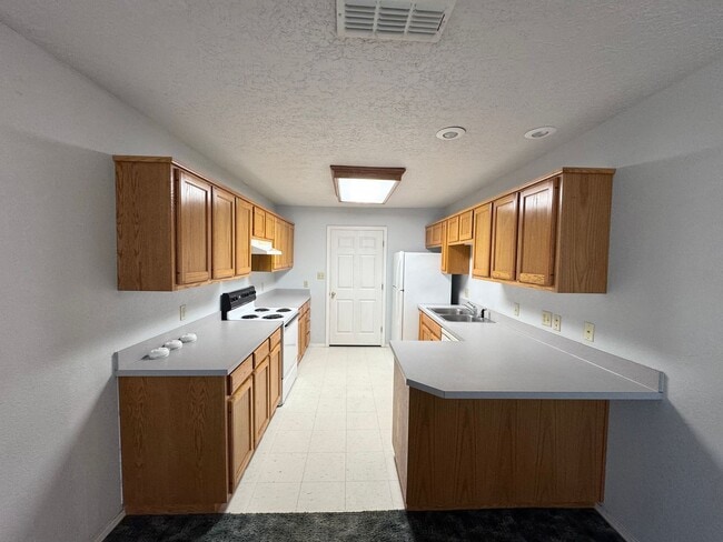 Photo - 420 E 9th St Unidad 2 (1169)