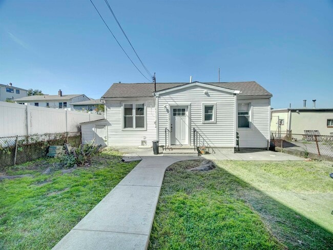 Building Photo - 7021 Durham Ave Unit Rear