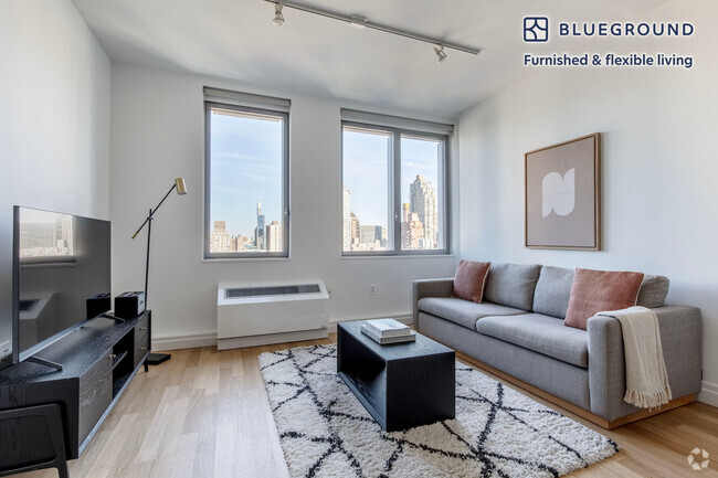 Building Photo - 554 W 54th St Unit FL28-ID1311 Rental