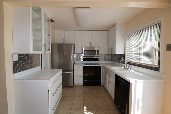 Photo - FRESH PAINT AND NEW FLOORING = 3BD + 2.5BA TH