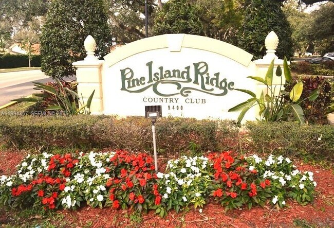 Building Photo - 9441 Live Oak Pl Unit 207