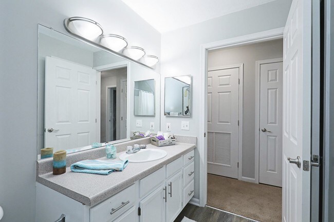 Bright, modern bathroom with ample counter space and sleek finishes for a clean, fresh look.