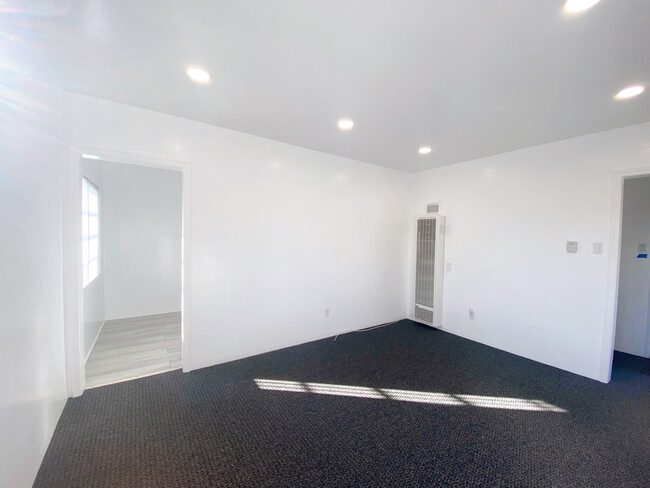 Upgraded living room - 5819 E Ocean Blvd Apartments Unit 5819 E. Ocean Blvd.