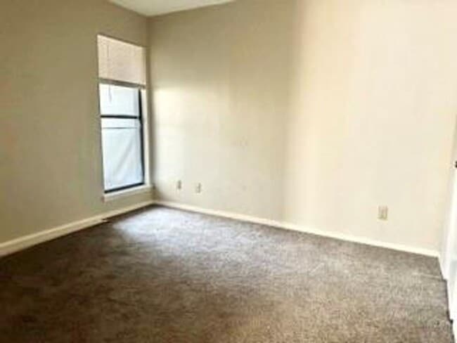 Photo - First-Floor 2BR/2BA Condo in Plano with Fireplace + 2 Carports