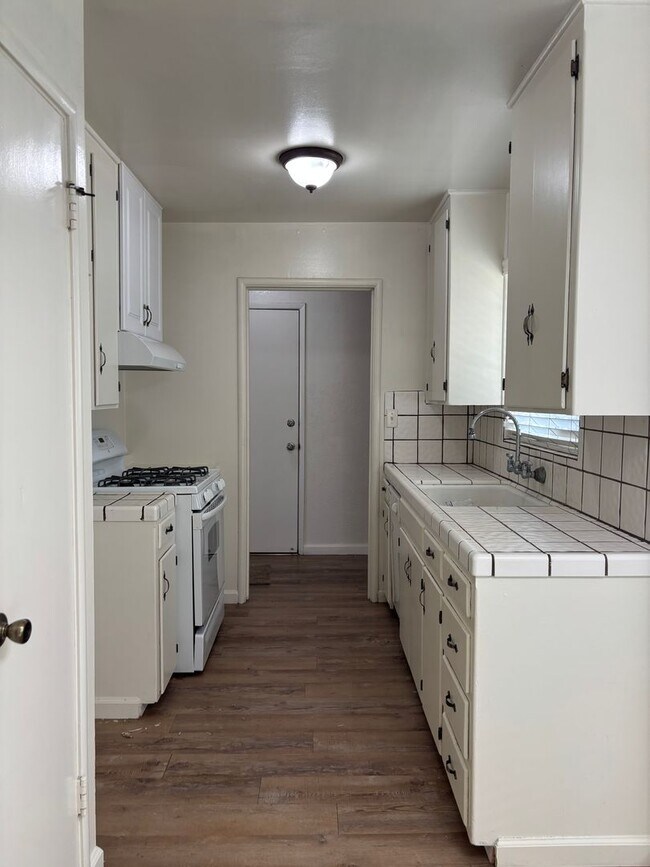 Photo - Updated 3 bedroom 2 bathroom home with large backyard, corner lot, close to shopping and schools ...