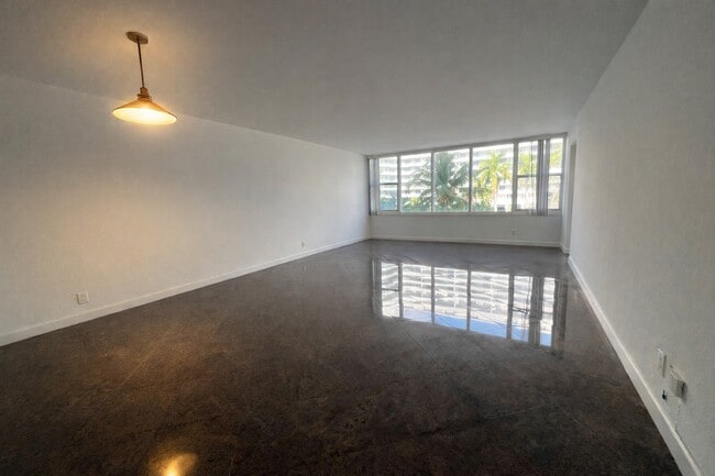 Living Area with Granite Floors - 5600 Collins Ave Unit 4E