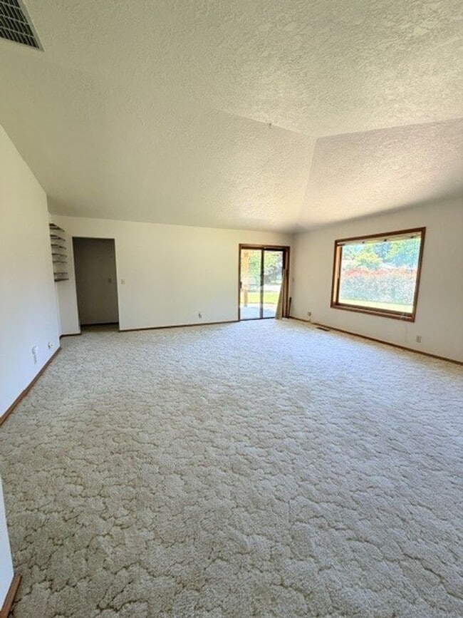 Photo - Charming 3-Bedroom Home with Garage & Lawn Care Included