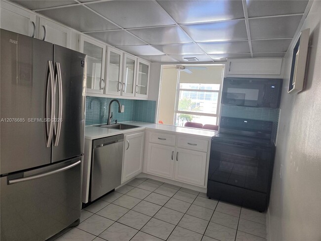 Photo - 501 Three Islands Boulevard Unit 209