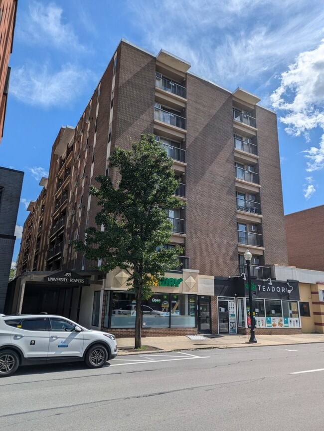 Building Photo - High Rise Living Directly Across the Street from Campus!