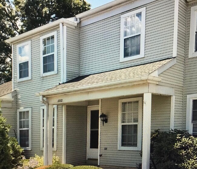 Front - 1002 Cambridge Ct Townhome