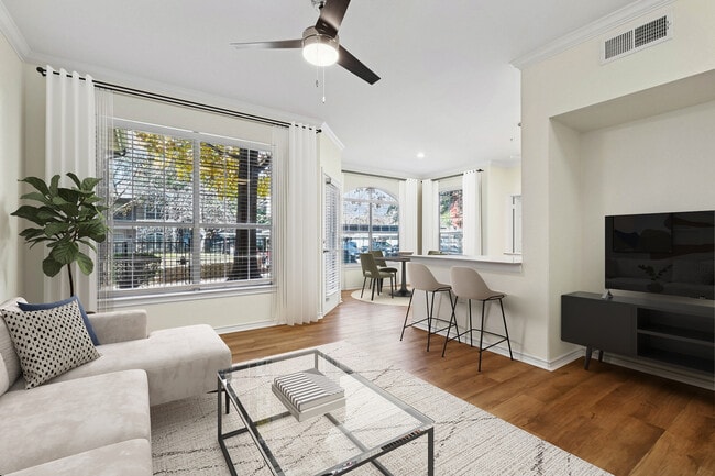 Renovated Package I living room with hard surface flooring