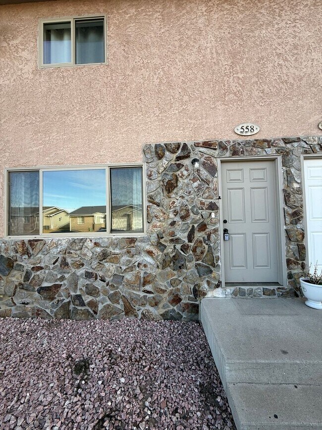 Building Photo - Modernly updated two bedroom, one and half bathroom townhome located within walking distance to R...