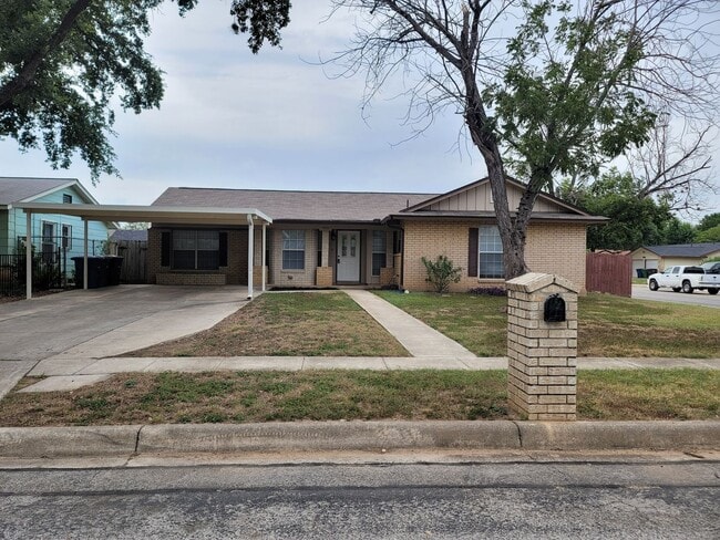 Building Photo - Four Bedroom Ranch with New Flooring Rental