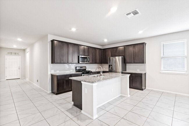 Photo - A rare true dual-suite floorplan in Alamo Ranch — two private en-suite bedrooms, single-story liv...
